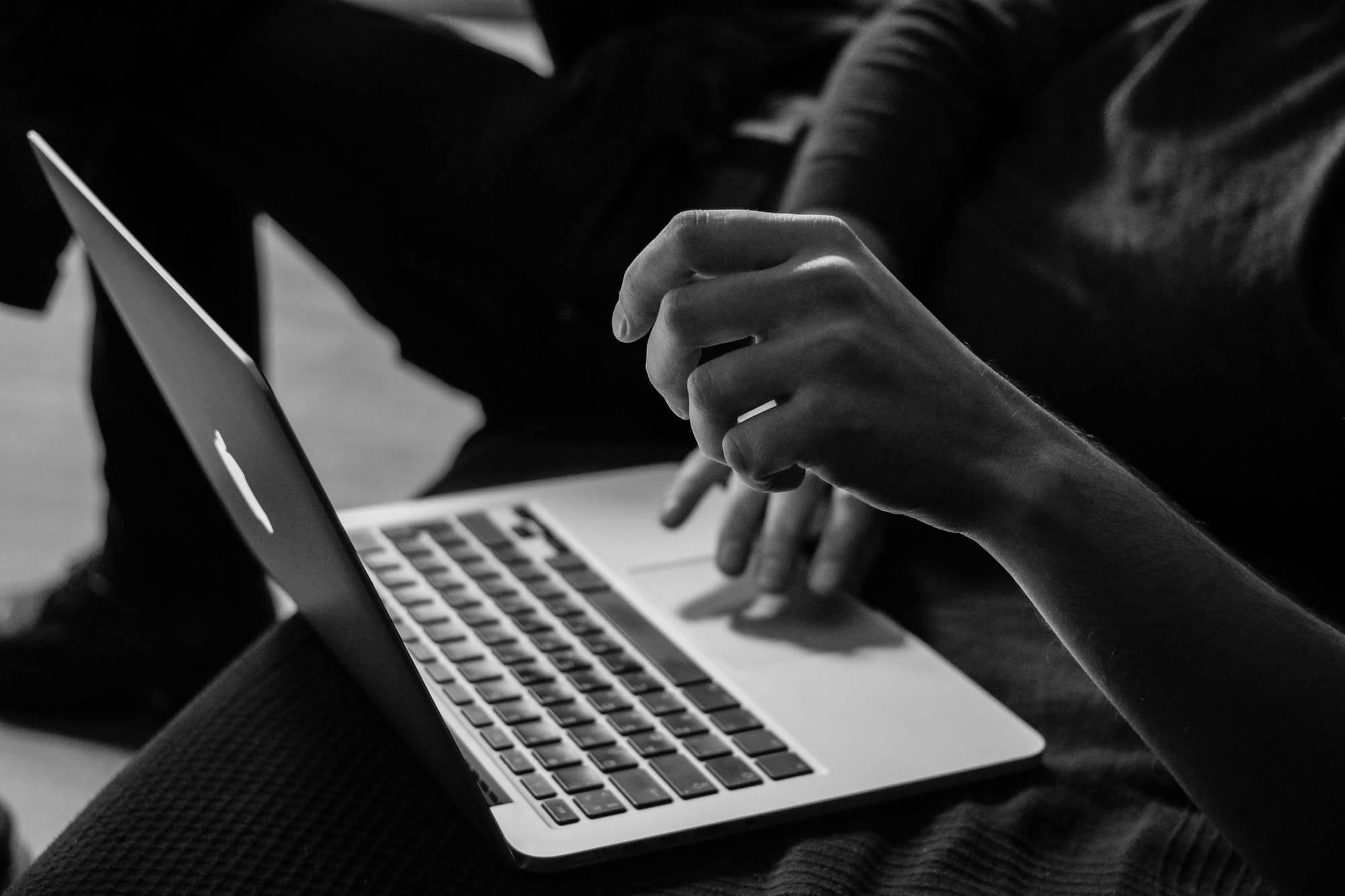 woman working hard on laptop - Best AI Writing Assistant