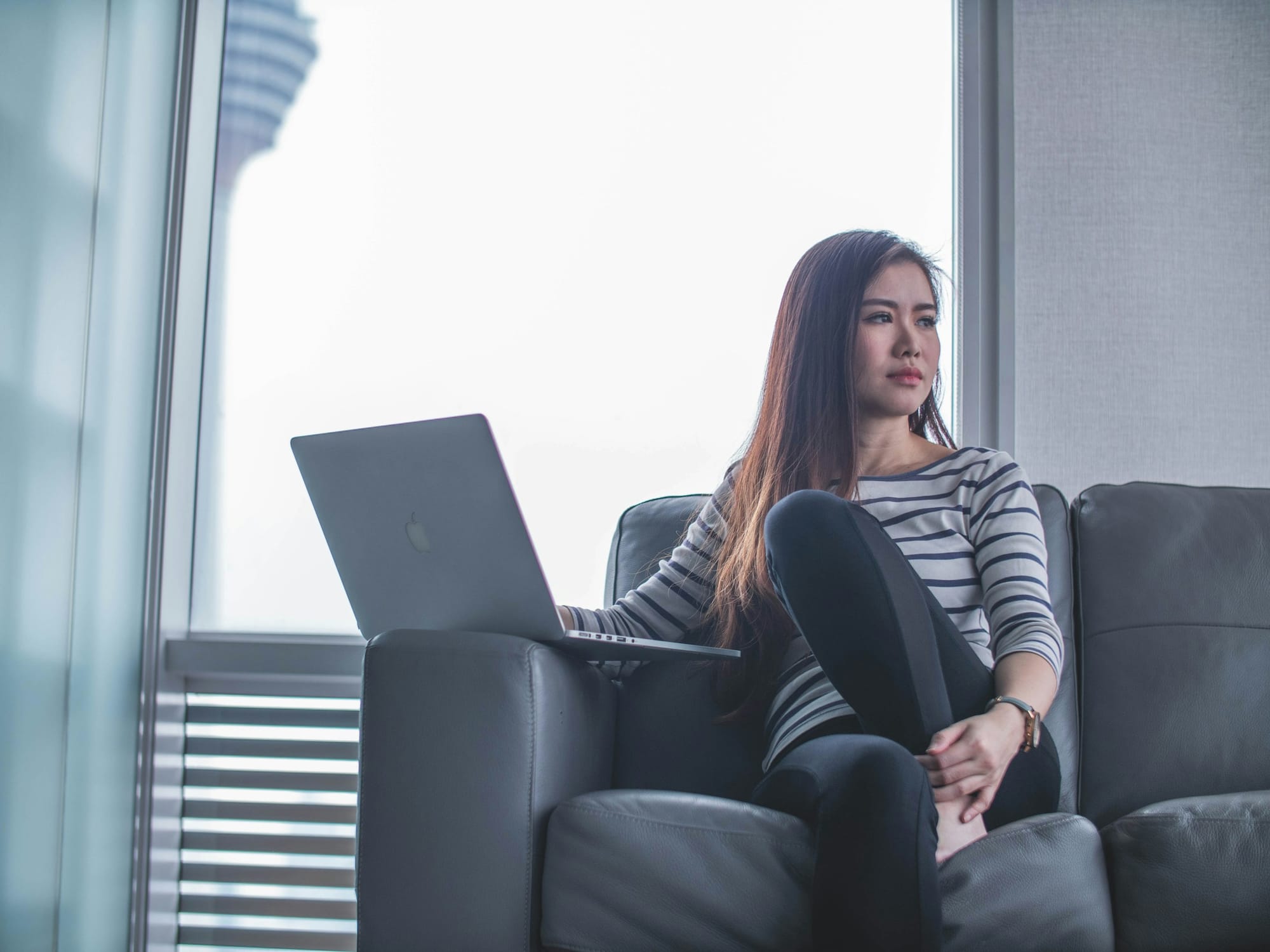 woman enjoying benefits of SEO Content Writing Software