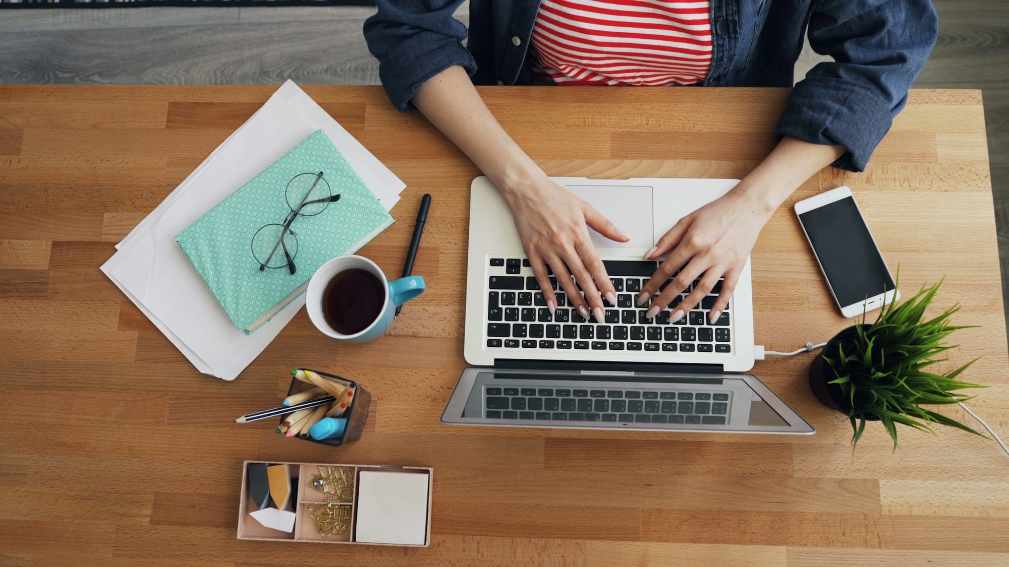 woman on a desk - AI Content Creation Tools