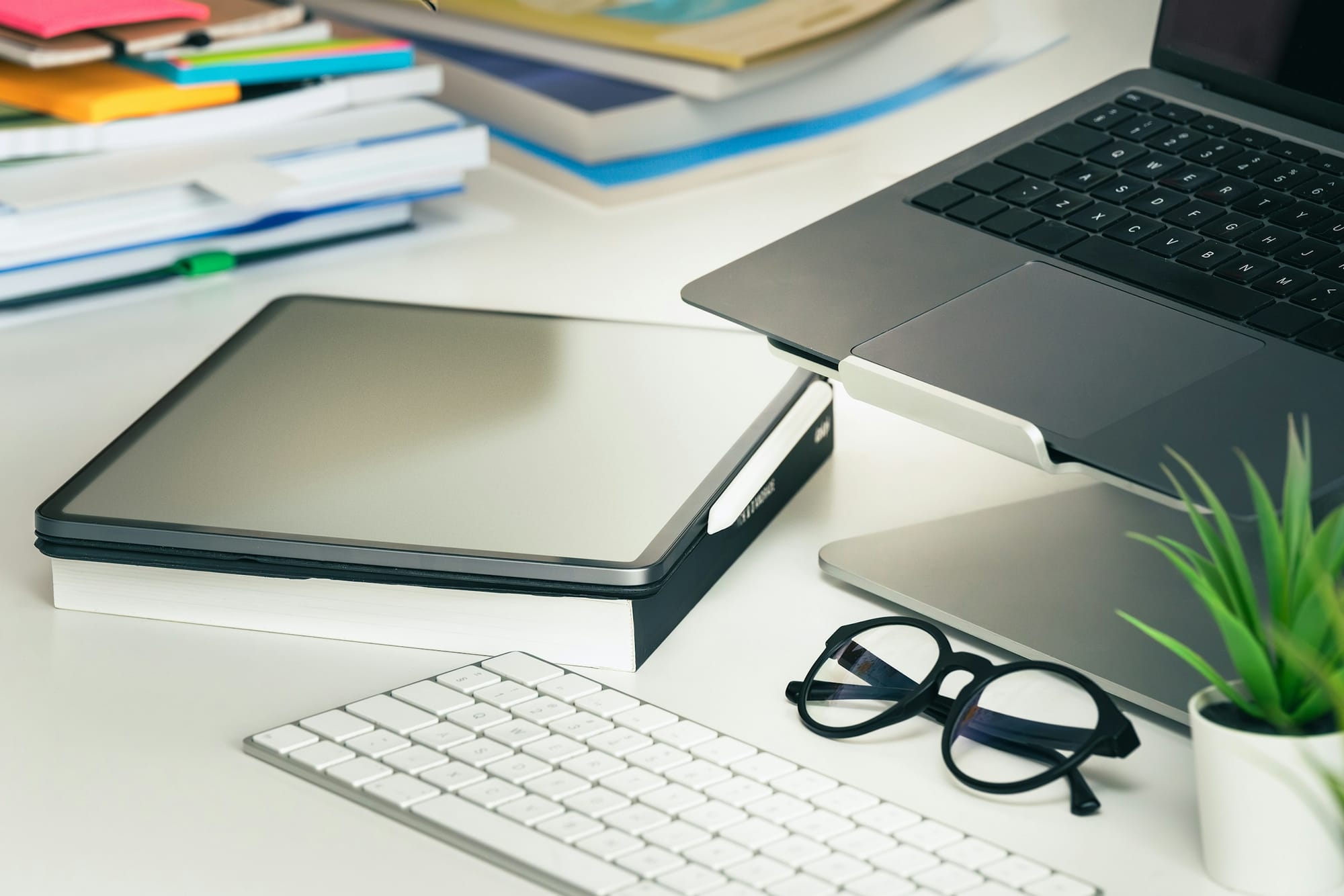 laptop and keyboard with glasses - Internal Linking Tools